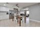 Spacious kitchen showcasing modern appliances and a tile backsplash at 13913 N 2Nd Ave, El Mirage, AZ 85335