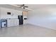 Spacious kitchen features tile floors, cabinets, and essential appliances at 13913 N 2Nd Ave, El Mirage, AZ 85335