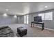 Cozy living room with plush carpet, neutral tones, and ample natural light at 13913 N 2Nd Ave, El Mirage, AZ 85335