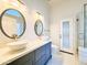 Beautifully updated bathroom featuring dual sinks, quartz countertops, and a modern design at 1463 E Silver Creek Rd, Gilbert, AZ 85296