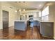Modern kitchen with stainless steel appliances, granite countertops, and a kitchen island at 1463 E Silver Creek Rd, Gilbert, AZ 85296