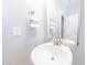 Bathroom features a mirror, brushed nickel fixtures and a pedestal sink at 15248 S 182Nd Ln, Goodyear, AZ 85338