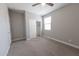 Bedroom features carpet, window, and a closet with a sliding door at 15248 S 182Nd Ln, Goodyear, AZ 85338