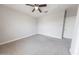 Clean bedroom with a ceiling fan and a bright window at 15248 S 182Nd Ln, Goodyear, AZ 85338