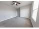Spacious bedroom featuring a closet and a window at 15248 S 182Nd Ln, Goodyear, AZ 85338