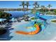 Community pool with a toddler area including a small orange slide at 15248 S 182Nd Ln, Goodyear, AZ 85338