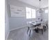 Elegant dining room featuring modern chandelier and natural light, perfect for Gathering meals at 15248 S 182Nd Ln, Goodyear, AZ 85338