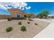 Charming single-story home with a well-maintained yard and spacious two-car garage at 15248 S 182Nd Ln, Goodyear, AZ 85338