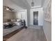 Inviting foyer with tile floors, a stylish light fixture, and access to living room at 15248 S 182Nd Ln, Goodyear, AZ 85338