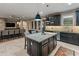 Beautiful kitchen with granite countertops, stainless steel appliances, and an island with bar seating at 17728 N 92Nd Pl, Scottsdale, AZ 85255