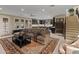 Open-concept living area flowing into the modern kitchen, perfect for seamless living and entertaining at 17728 N 92Nd Pl, Scottsdale, AZ 85255