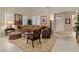 Inviting living room with plush seating, elegant decor, and abundant natural light at 17728 N 92Nd Pl, Scottsdale, AZ 85255