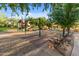 Community playground with slides, swings, and seating areas, perfect for families at 17728 N 92Nd Pl, Scottsdale, AZ 85255