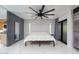 Open and airy bedroom featuring white marble floors, modern lighting, and a neutral color palette at 1861 W Navarro Ave, Mesa, AZ 85202