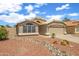 Beautiful single-story home with desert landscaping and a well-maintained front yard at 20443 N 97Th Ave, Peoria, AZ 85382