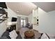Inviting living room with fireplace, wet bar, and a vaulted ceiling offers a comfortable space at 205 N 74Th St # 248, Mesa, AZ 85207