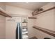 Walk-in closet with shelving to maximize storage, plus space for ironing board and a laundry basket at 205 N 74Th St # 248, Mesa, AZ 85207