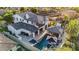 Stunning aerial view of a two-story home with a pool, spa, and covered outdoor living area at 20866 W Werner Pl, Buckeye, AZ 85396