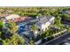 Gorgeous aerial view of the backyard featuring a pool, lawn, and detailed landscaping at 20866 W Werner Pl, Buckeye, AZ 85396