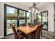 Bright dining area with patio views and modern lighting, perfect for entertaining at 20866 W Werner Pl, Buckeye, AZ 85396