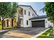 Two-story home with a two-car garage, beautiful landscaping, and stone accents at 20866 W Werner Pl, Buckeye, AZ 85396
