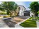 Charming two-story home boasting manicured landscaping, a spacious driveway, and a two-car garage at 20866 W Werner Pl, Buckeye, AZ 85396