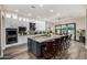 Stylish kitchen featuring a large island, ample storage, and stainless steel appliances at 20866 W Werner Pl, Buckeye, AZ 85396