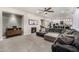 Cozy living room featuring a fireplace, comfortable seating, and open floor plan at 20866 W Werner Pl, Buckeye, AZ 85396