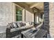 Inviting outdoor patio featuring stylish seating, a fire pit, and a serene setting at 20866 W Werner Pl, Buckeye, AZ 85396