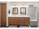 Bright bathroom features a double vanity with wood cabinets and a tiled walk-in shower at 2270 E Indian Wells Dr, Chandler, AZ 85249