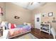Cozy bedroom features colorful bedding, complementary decor and ample natural light at 2270 E Indian Wells Dr, Chandler, AZ 85249