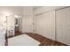 Bedroom with closet doors and a bathroom doorway at 2270 E Indian Wells Dr, Chandler, AZ 85249