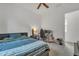 Bedroom with fan, desk, chair, bed, and guitar at 22927 E Via Del Oro --, Queen Creek, AZ 85142