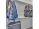 Walk-in closet with organized shelving and hanging storage for clothes at 22927 E Via Del Oro --, Queen Creek, AZ 85142