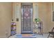 Welcoming front door, featuring decorative accents and a lovely welcome mat at 22927 E Via Del Oro --, Queen Creek, AZ 85142