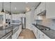Well-equipped kitchen includes stainless steel appliances, gas range, and stylish backsplash at 22927 E Via Del Oro --, Queen Creek, AZ 85142