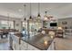 This kitchen is connected to the living and dining areas, and features lots of natural light at 22927 E Via Del Oro --, Queen Creek, AZ 85142