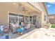 Outdoor patio featuring comfortable seating, a ceiling fan, and a view of the backyard at 22927 E Via Del Oro --, Queen Creek, AZ 85142