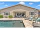 Step into luxury with this backyard oasis and sparkling pool, perfect for relaxation and gatherings at 22927 E Via Del Oro --, Queen Creek, AZ 85142