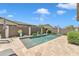 Private swimming pool with a patio, lounge chairs, and tasteful landscaping at 22927 E Via Del Oro --, Queen Creek, AZ 85142