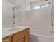 Bathroom with shower, bathtub, and single sink vanity at 22963 W La Pasada Blvd, Buckeye, AZ 85326