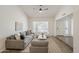 Inviting living room with neutral colors and a large window with a view of the front yard at 2307 W Nido Ave, Mesa, AZ 85202
