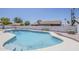 Refreshing backyard pool surrounded by hardscape and a privacy fence at 2307 W Nido Ave, Mesa, AZ 85202
