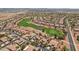 Aerial view of community and golf course featuring desert landscaping at 23225 N Hank Raymond Dr, Sun City West, AZ 85375