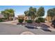 Single-story home with desert landscaping, tile roof and attached two car garage at 23225 N Hank Raymond Dr, Sun City West, AZ 85375