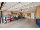Spacious garage providing ample space for parking and storage, featuring an organized workspace at 23225 N Hank Raymond Dr, Sun City West, AZ 85375