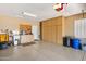 Well-organized garage with built-in cabinets and a functional workspace with a sink for convenience at 23225 N Hank Raymond Dr, Sun City West, AZ 85375