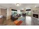 Bright living room with comfortable seating, fireplace, and view into the dining area at 2333 E Southern Ave # 1049, Tempe, AZ 85282