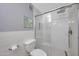 Elegant shower with a glass door and white herringbone tiling at 2333 E Southern Ave # 1049, Tempe, AZ 85282