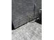 Backyard with paving stones, gravel, and an air conditioning unit at 2364 N 212Th Ave, Buckeye, AZ 85396